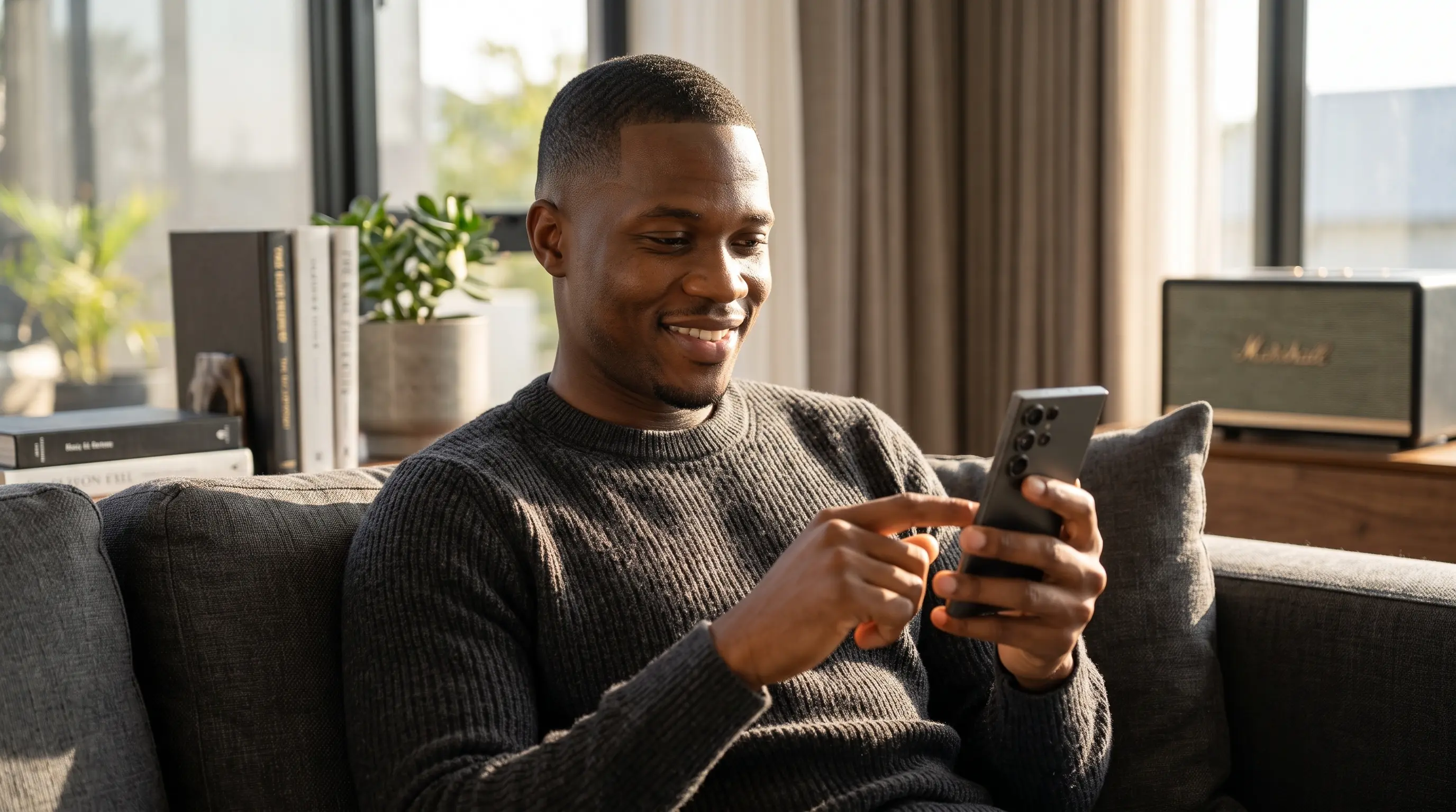 Man multitasking with electronic devices